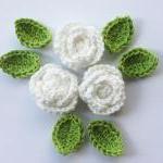 white crochet roses
