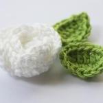 white crochet roses